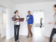 Couple making an agreement with estate agent