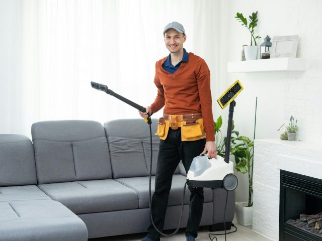 Process of deep furniture cleaning, removing dirt from sofa. Washing concept.