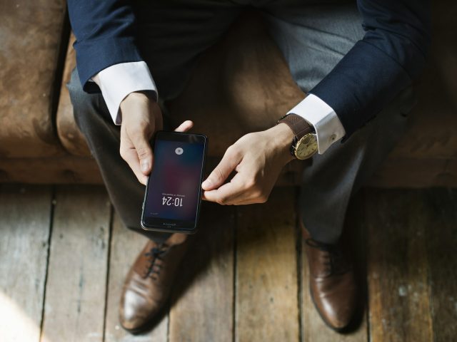A businessman using a smartphone